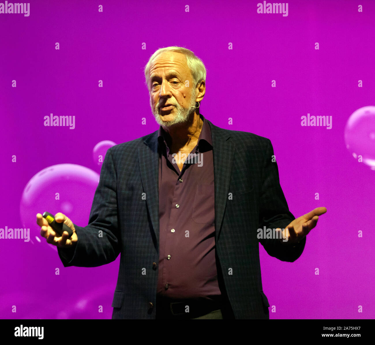 Robert Plomin, Geneticist at King's College London, giving a talk entitled 'Predicting school performance from DNA ', on the Humans Stage, at New Scientist Live 2019 Stock Photo