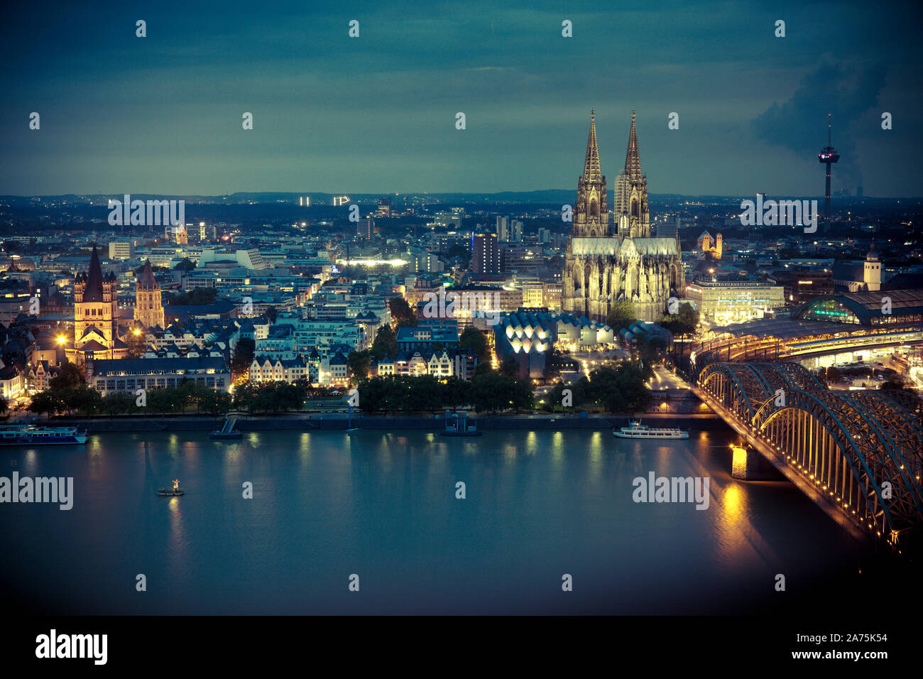 Germany, North Rhine Westphalia, Cologne (Koln), Hohenzoller Bridge over River Rhine and Cathedral Stock Photo