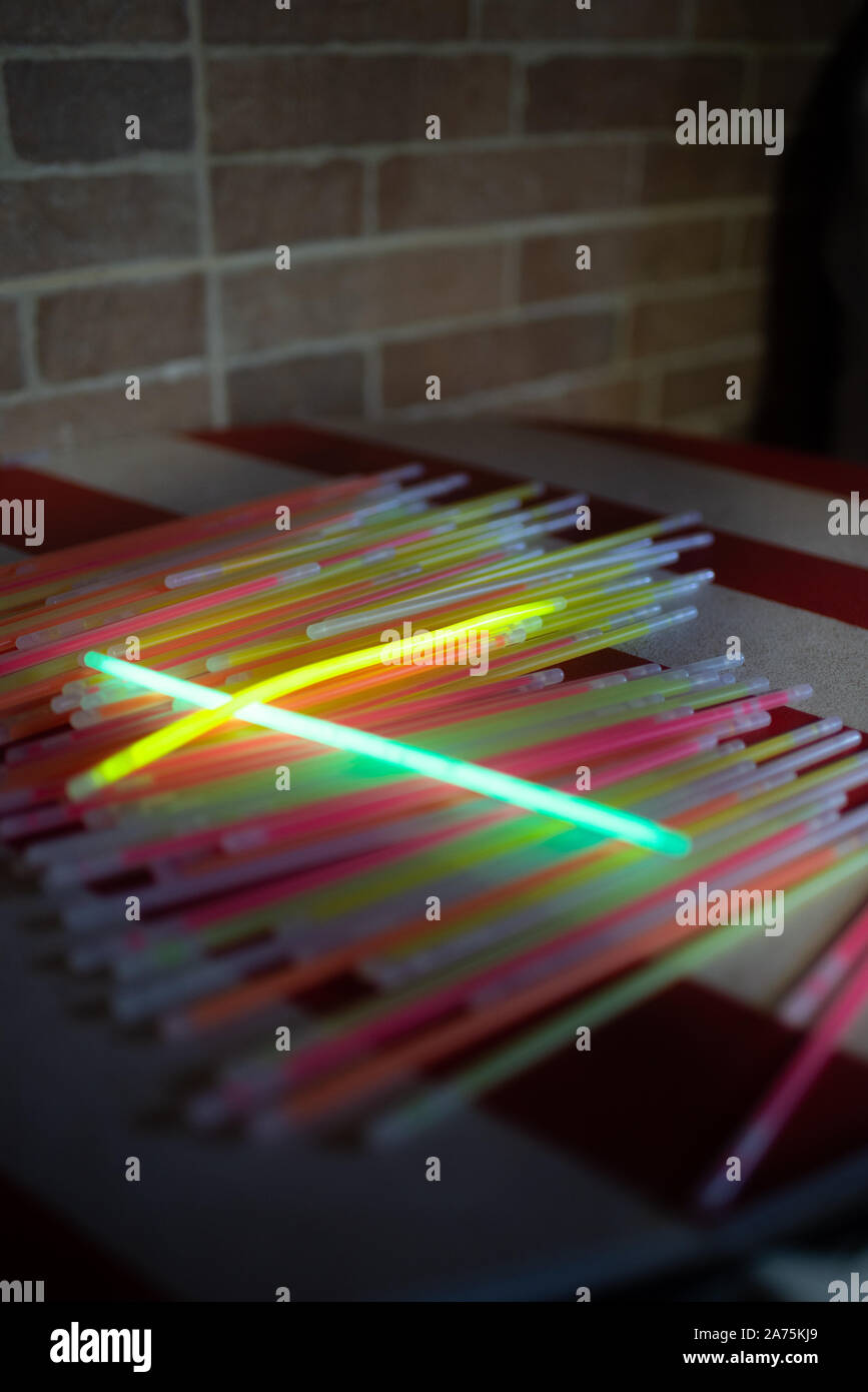 Collection of glowsticks on a night party Stock Photo