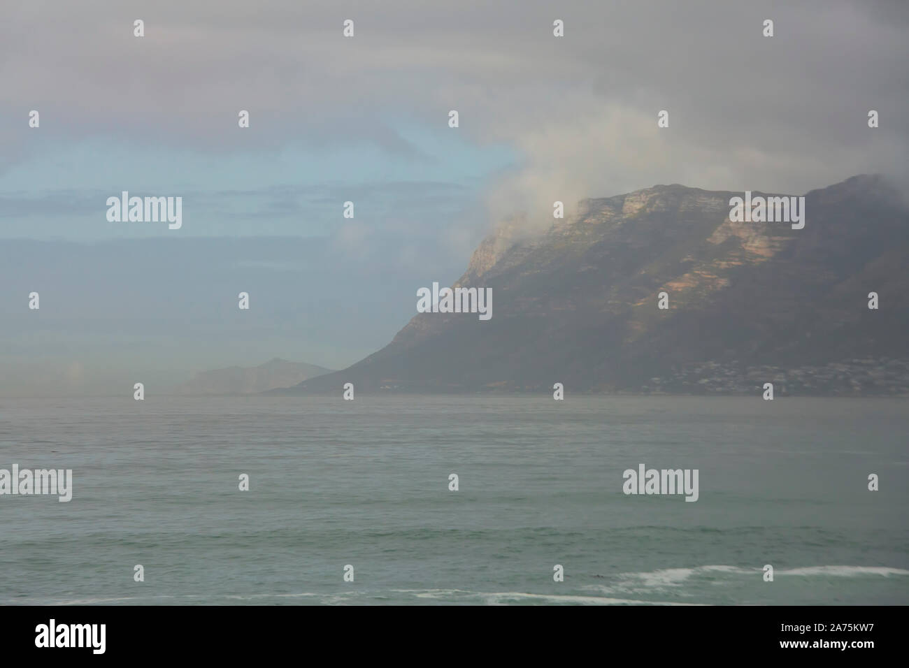 Foggy mountain at  Cape Peninsula,, Muizenberg , False Bay, South Africa Stock Photo