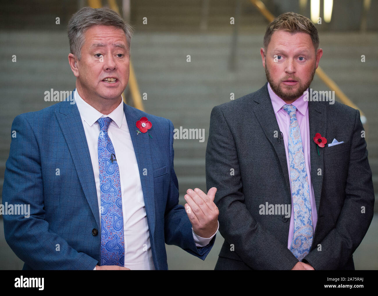 Edinburgh, 30 October 2019. Pictured: (left-right) Keith Brown MSP - Depute Leader of the Scottish National Party (SNP);, Jamie Green MSP - Shadow Cabinet Secretary for Transport, Infrastructure and Connectivity. Scenes from inside the Scottish Parliament in Edinburgh.  Credit: Colin D Fisher/CDFIMAGES.COM Stock Photo