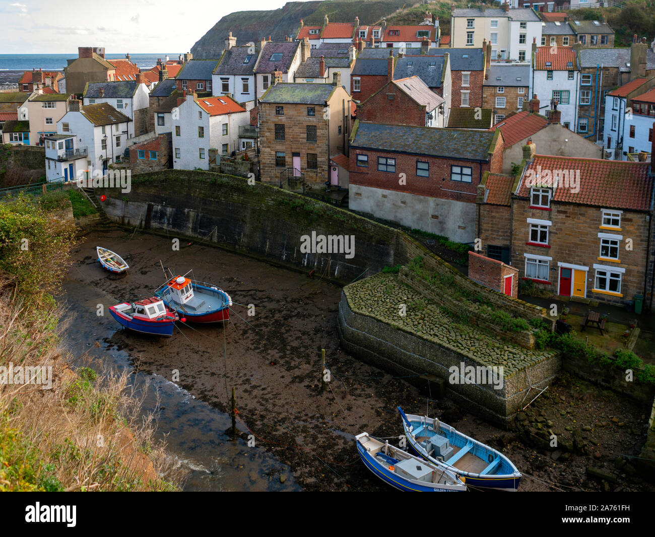 The view looking over Roxby Beck from Cowbar towards the North Yorkshire Village of Staithes Stock Photo