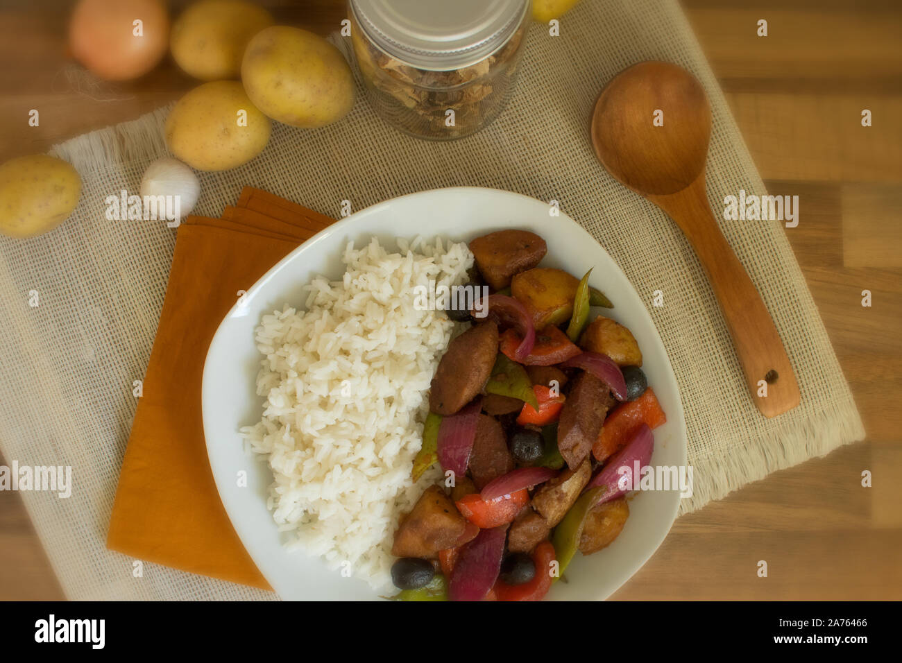 Vector illustration of a stir fry with vegetables, sausage and rice Stock Photo