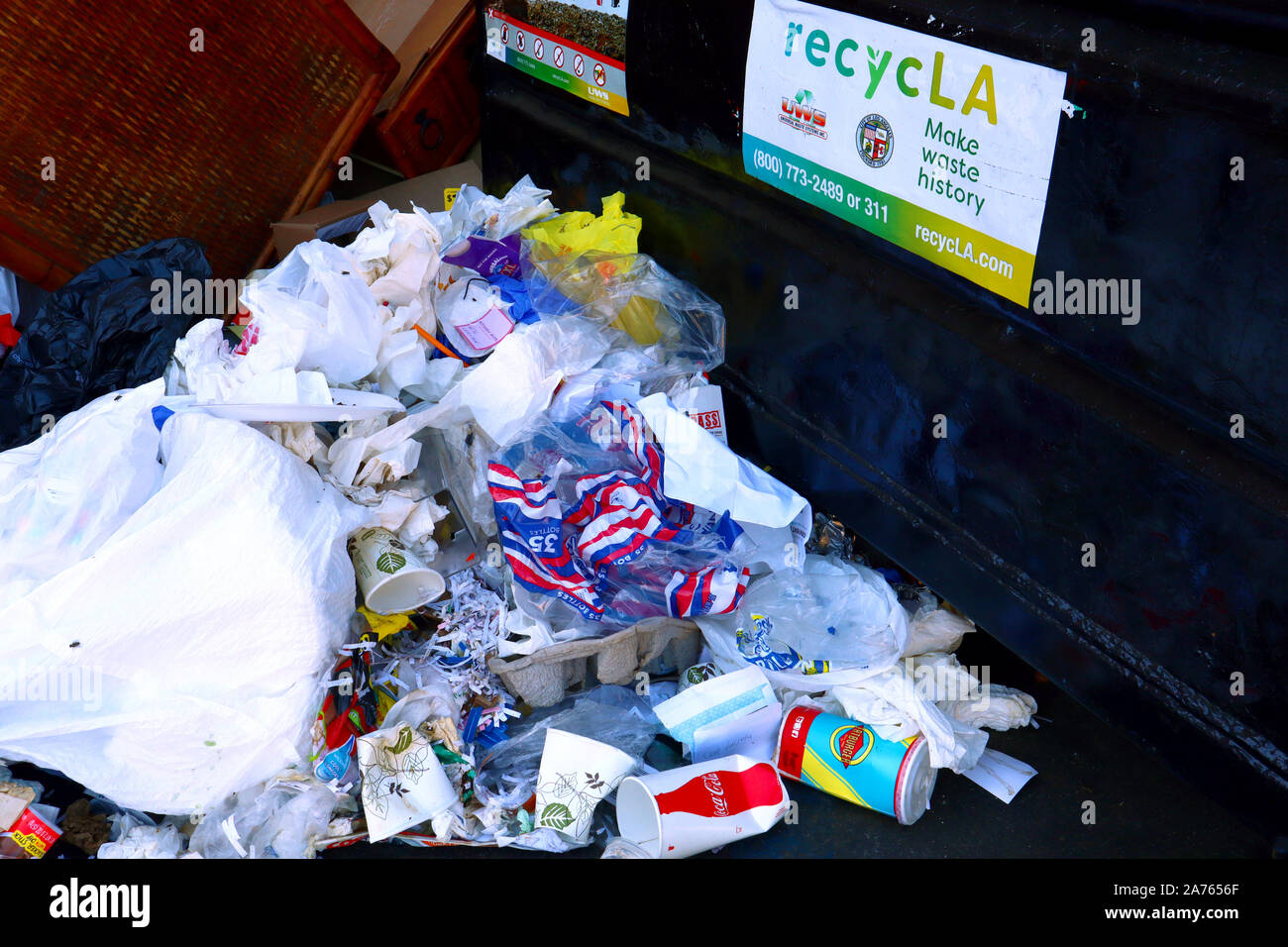 recycLA UWS Universal Waste Systems Inc. Container with garbage on the street in Los Angeles Stock Photo