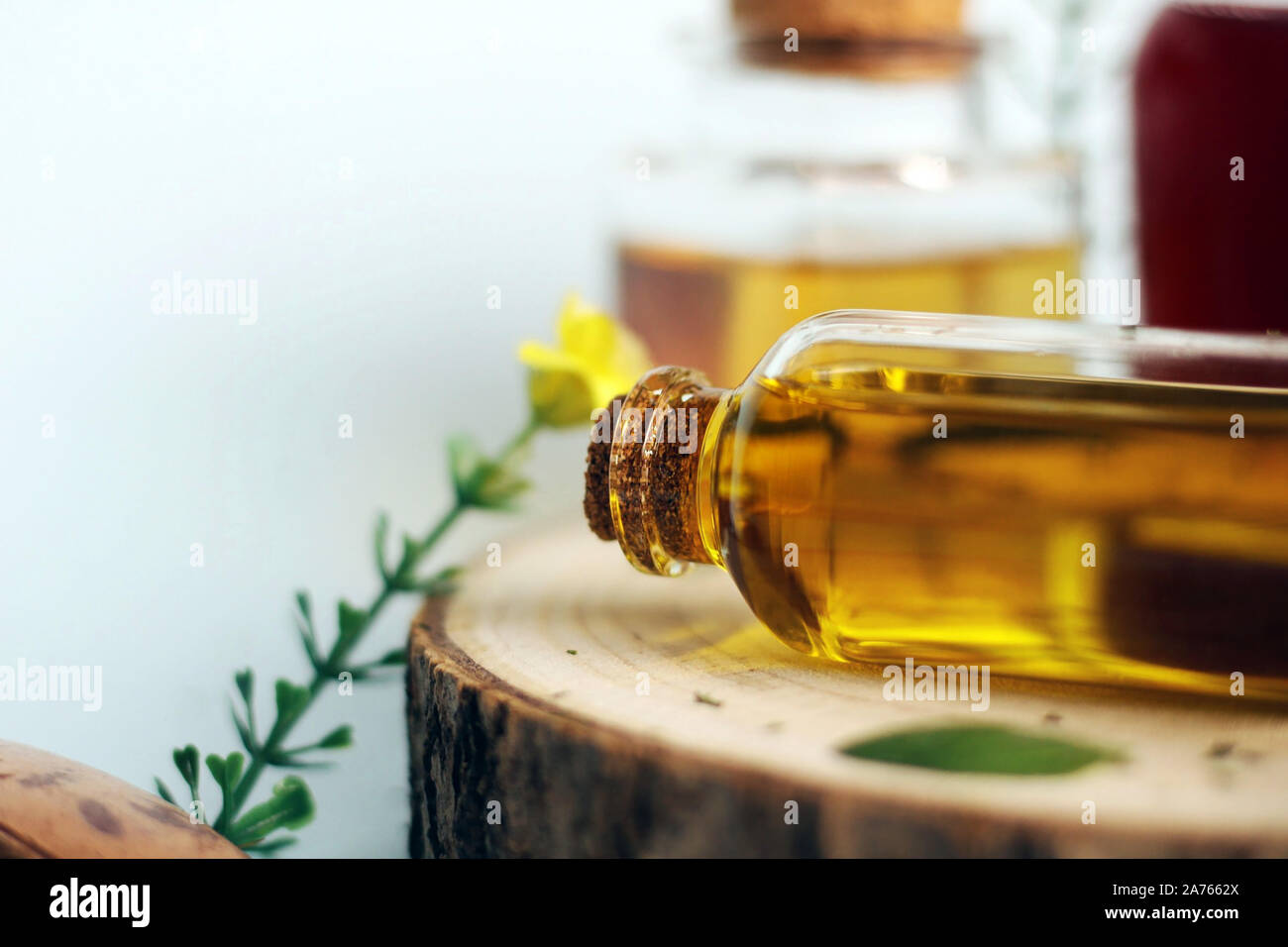 Natural Medicine: Essential oil in a glass jar. Herbal and Alternative Medicine. Stock Photo