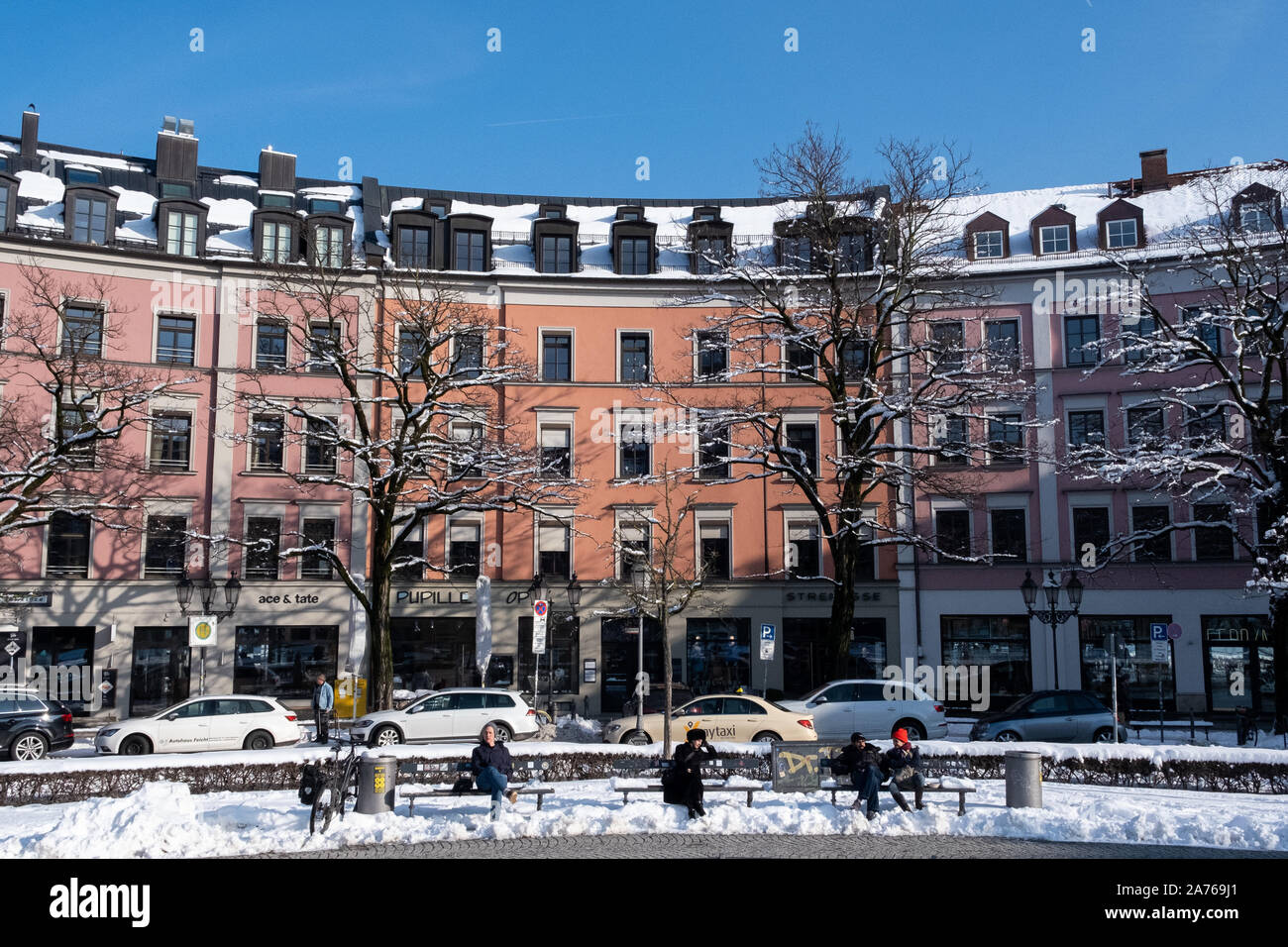 Colorful European buildings with beautiful contrast from fresh snowfall Stock Photo