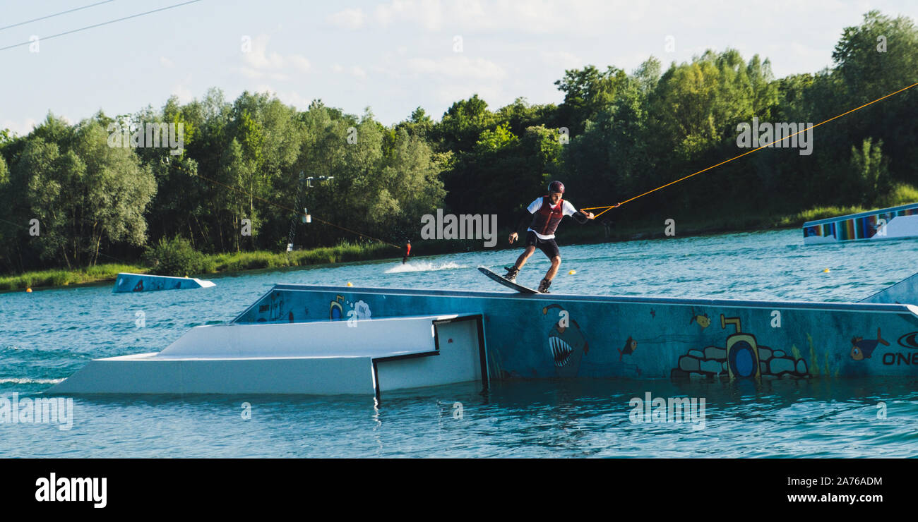 Summer afternoon spent at a wakeboard park Stock Photo Alamy
