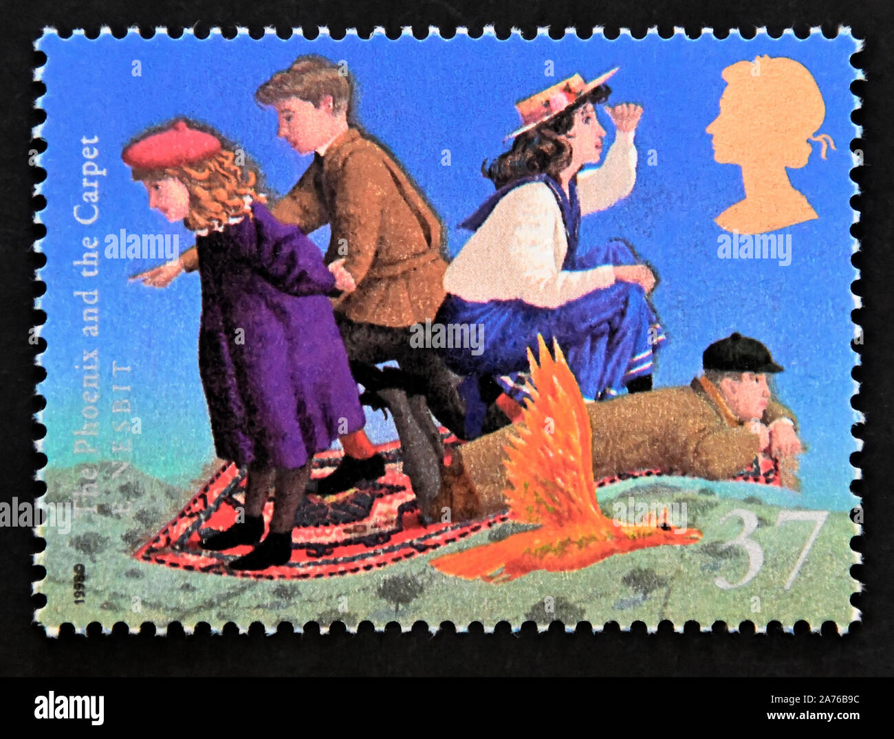 Postage stamp. Great Britain. Queen Elizabeth II. Famous Children's Fantasy Novels. 'The Phoenix and the Carpet' (E Nesbit). 37p. Stock Photo