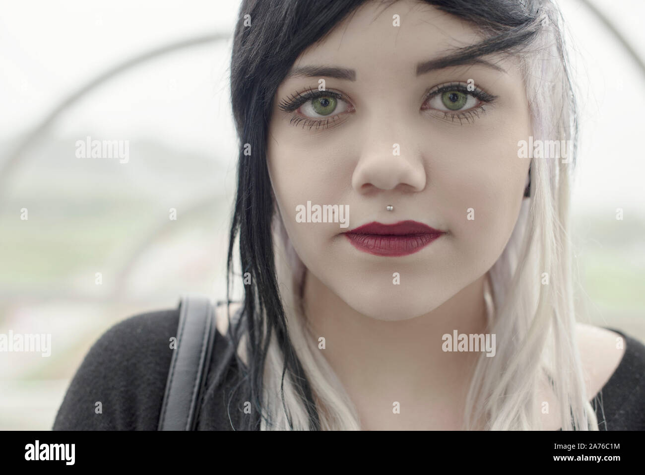 Curitiba, Parana, Brazil - November 15, 2015: Caucasian Brazilian girl with green eyes, beautiful make-up and dyed hair Stock Photo