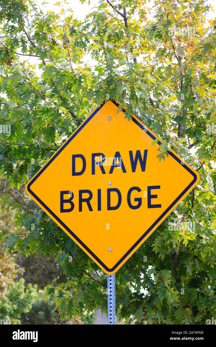 Road traffic sign post warning of Draw Bridge, Tower Bridge, Sacramento, State capital of California, United States of America. Stock Photo