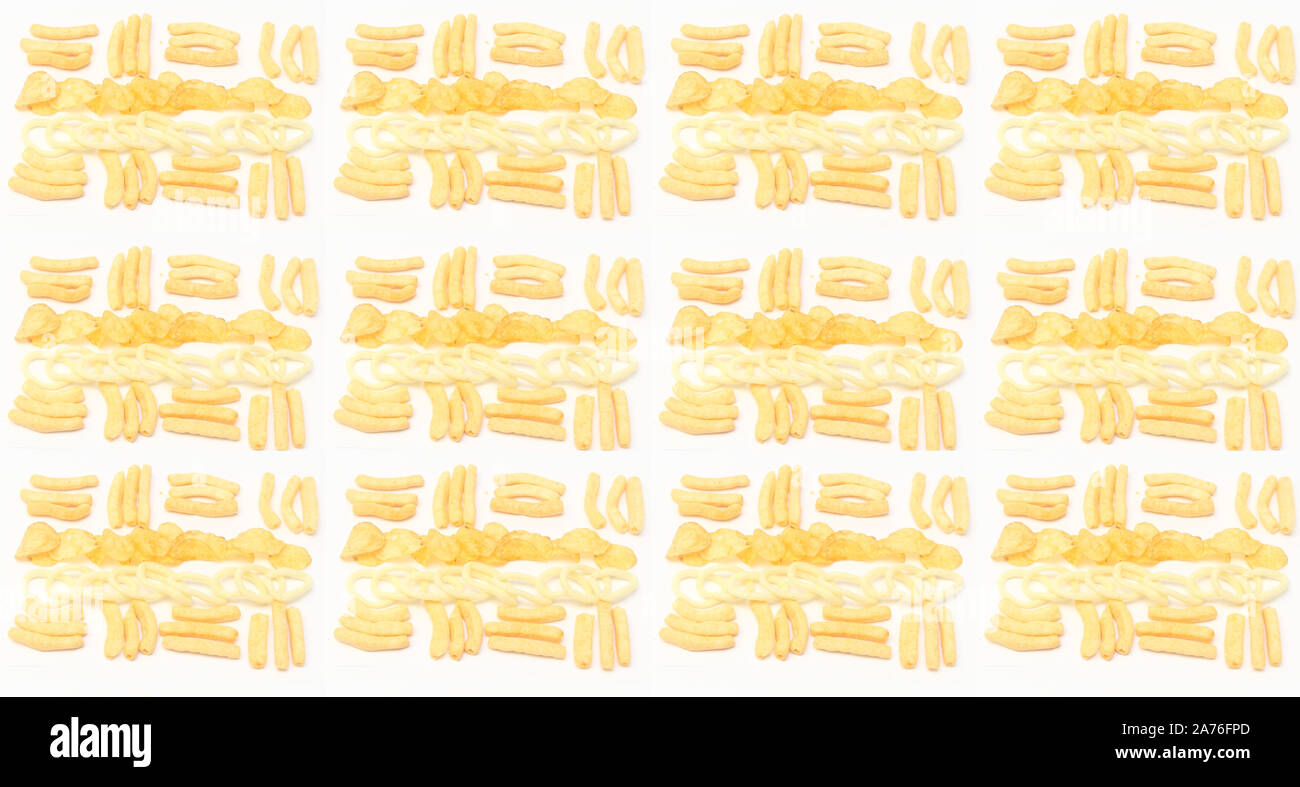 background with various potato chips on a white background Stock Photo