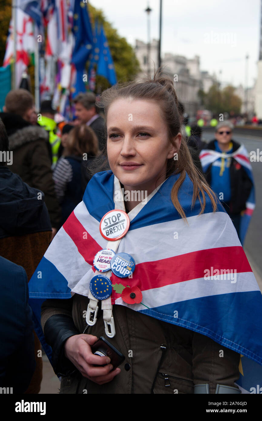 Female anti-Brexit campaigner outside the Houses of Parliament in London, UK Stock Photo