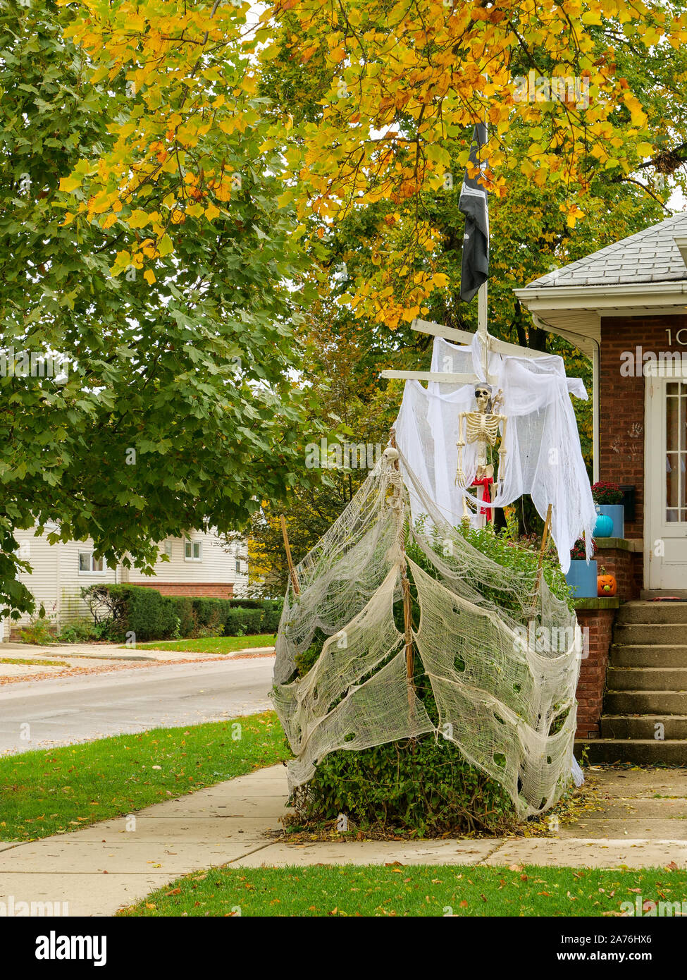 Bushes turned into a ghost pirate ship for Halloween. Oak Park