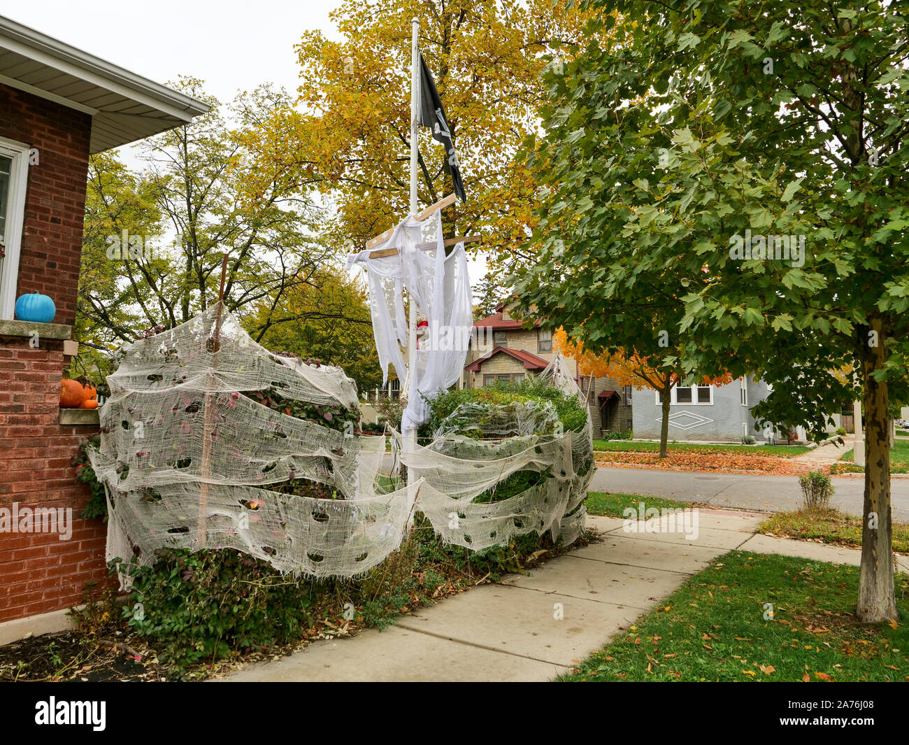 Bushes turned into a ghost pirate ship for Halloween. Oak Park