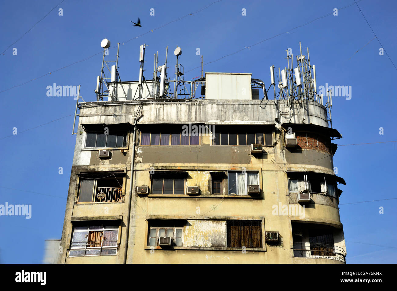 Mumbai India Many antennas on the roof top of the residential building with