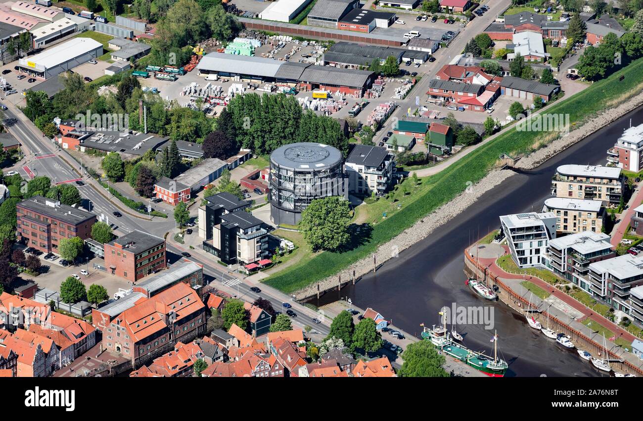 Aerial photograph, gas container at Stade city port, industrial monument, today residential building, Stade, Lower Saxony, Germany Stock Photo