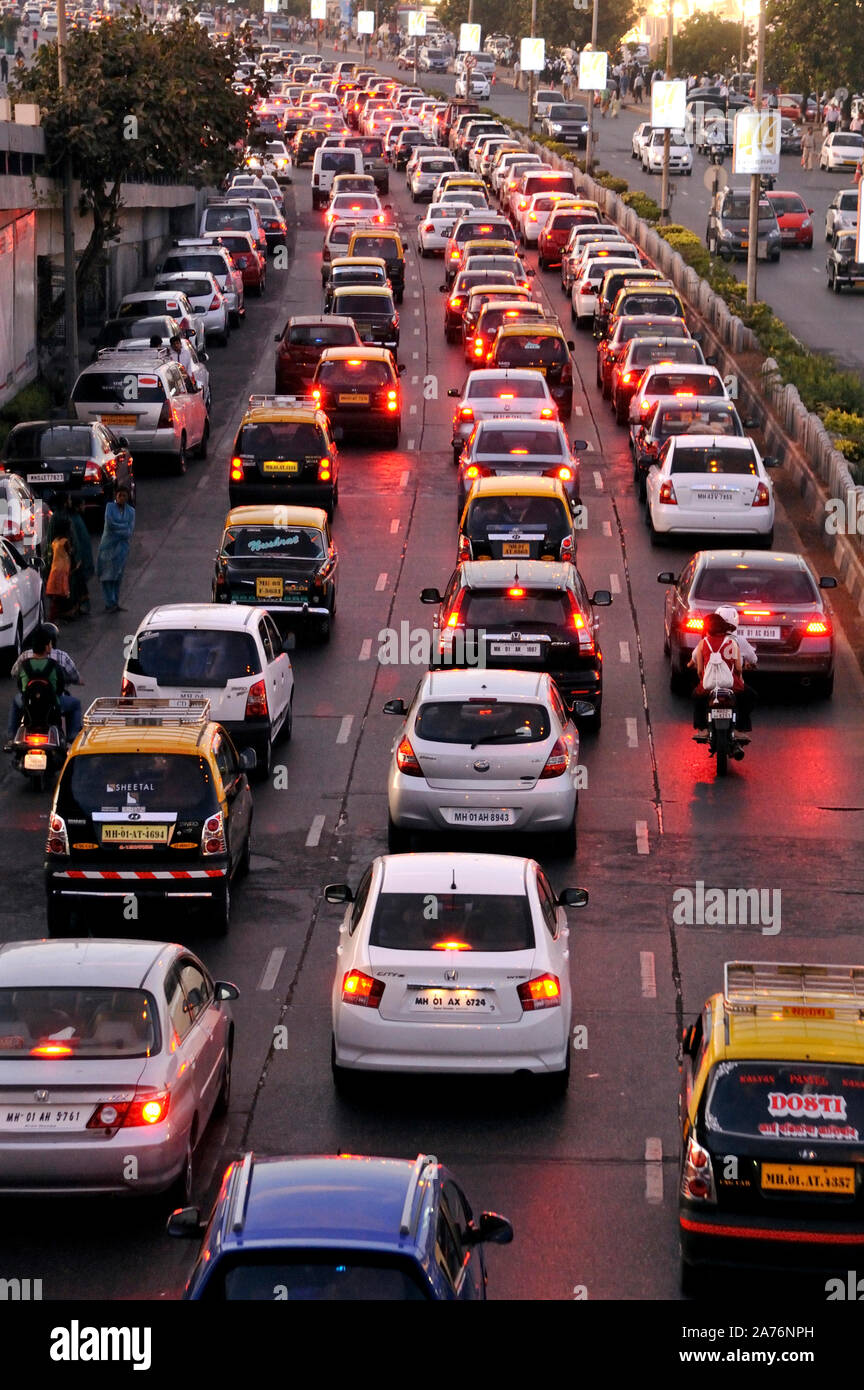 Mumbai, Maharashtra, India, Southeast Asia -  Blurred image Traffic at Night Four Wheeler Cars Marine Drive, Maharshi Karve Road Stock Photo