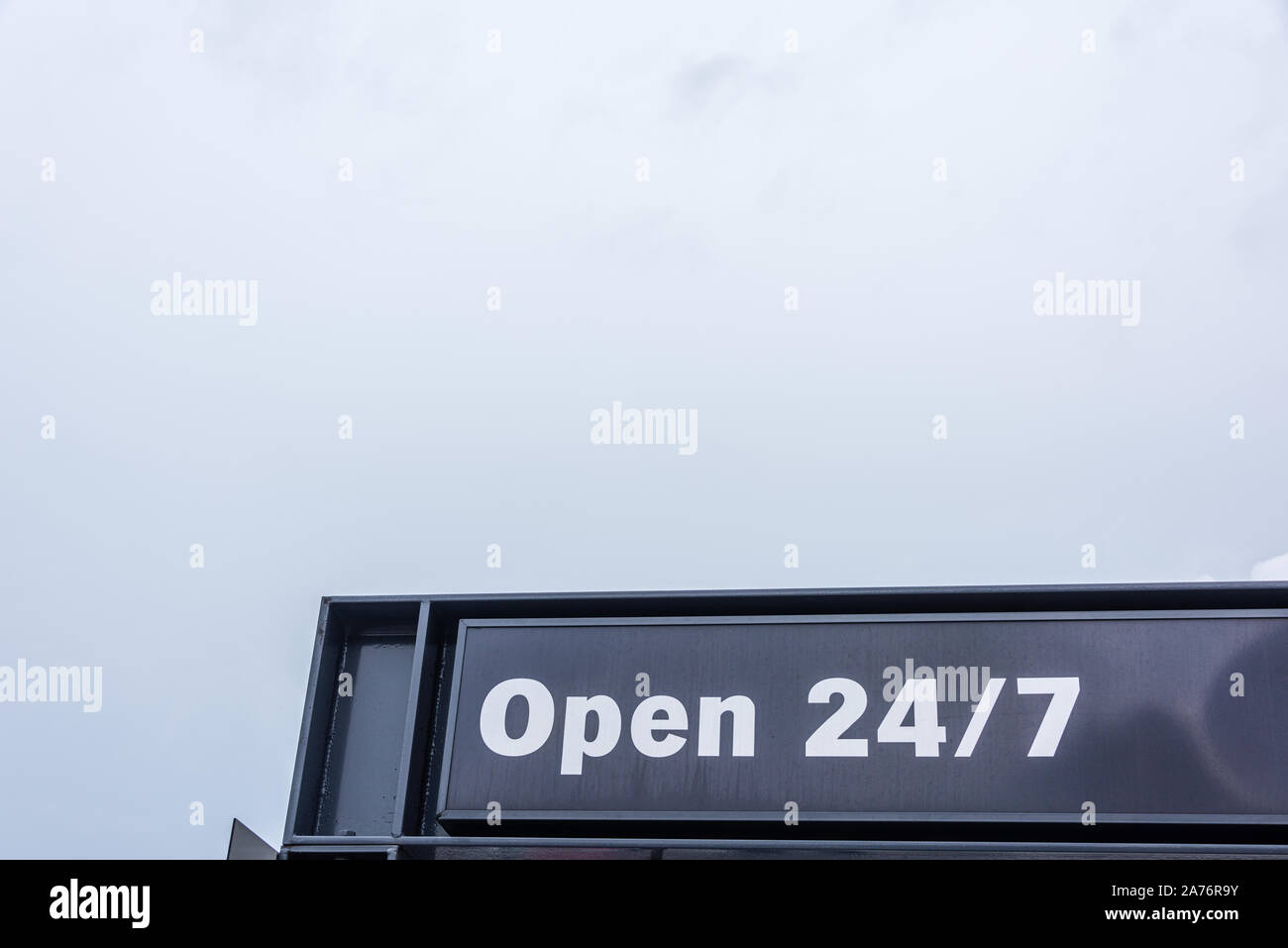 sign of Open 24/7 with a lot of empty space Stock Photo