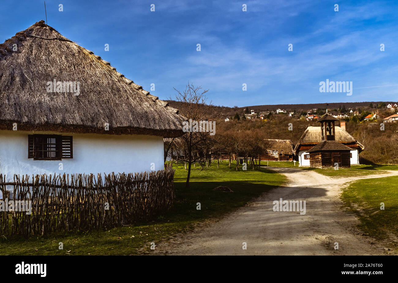 Traditional Hungarian houses in Szentendre Skanzen Village Museum on a sunny spring day. Stock Photo
