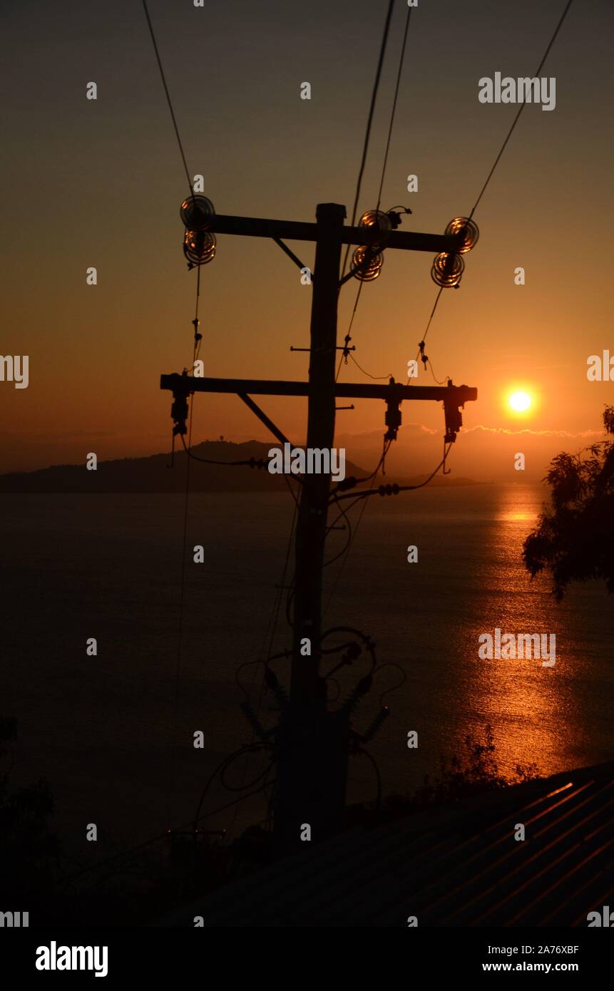 Australian landscape, electrical power lines at sunset Stock Photo Alamy