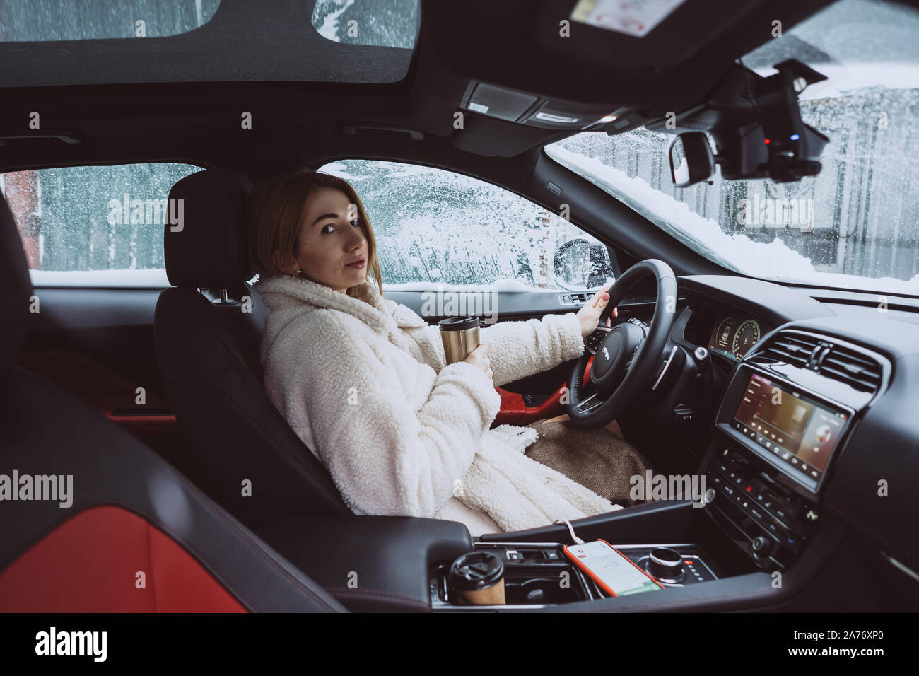 Girl behind steering wheel hi-res stock photography and images - Alamy