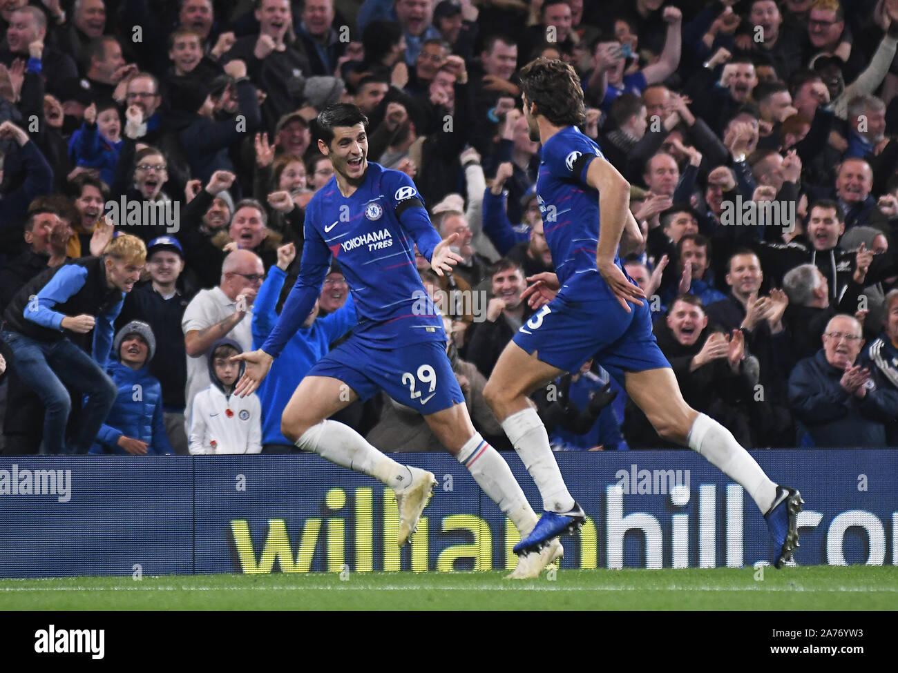 LONDON, ENGLAND - NOVEMBER 4, 2018: Alvaro Morata of Chelsea (L) celebrates with Marcos Alonso of Chelsea after he scored a goal during the 2018/19 Premier League game between Chelsea FC and Crystal Palace FC at Stamford Bridge. Stock Photo