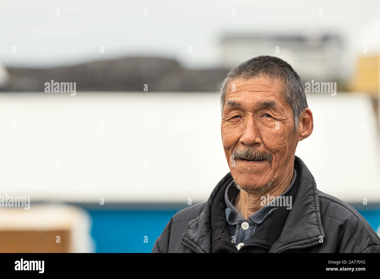 Portrait of an Inuit local mature man looking camera in Nuuk, Greenland. Stock Photo