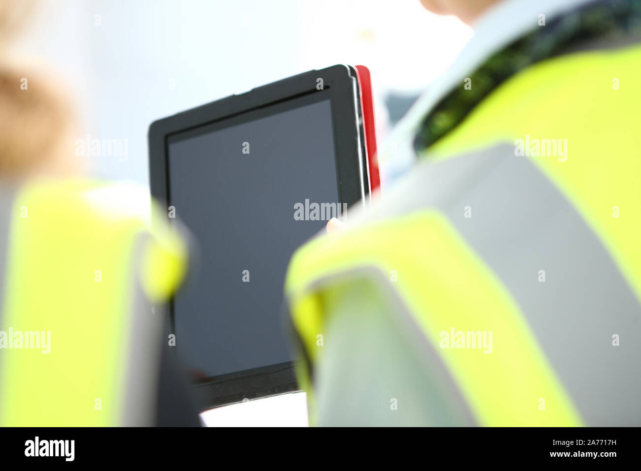 people at work with a table and papers Stock Photo