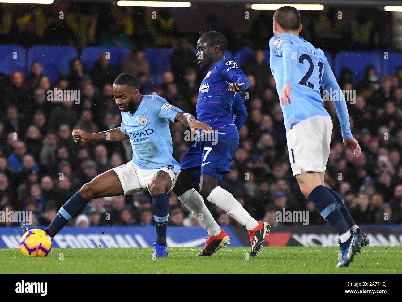 LONDON, ENGLAND - DECEMBER 8, 2018: Raheem Sterling of City (L) and N'Golo Kante of Chelsea (R) pictured during the 2018/19 Premier League game between Chelsea FC and Manchester City at Stamford Bridge. Stock Photo