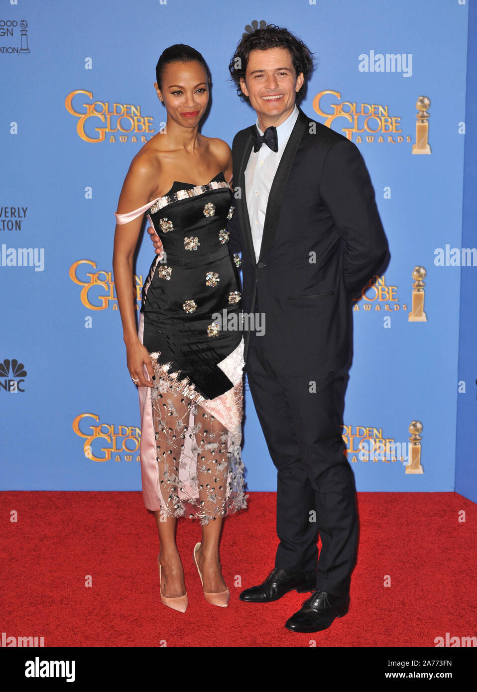 LOS ANGELES, CA - JANUARY 12, 2014: Orlando Bloom & Zoe Saldana in the press room at the 71st Annual Golden Globe Awards © 2014 Paul Smith / Featureflash Stock Photo