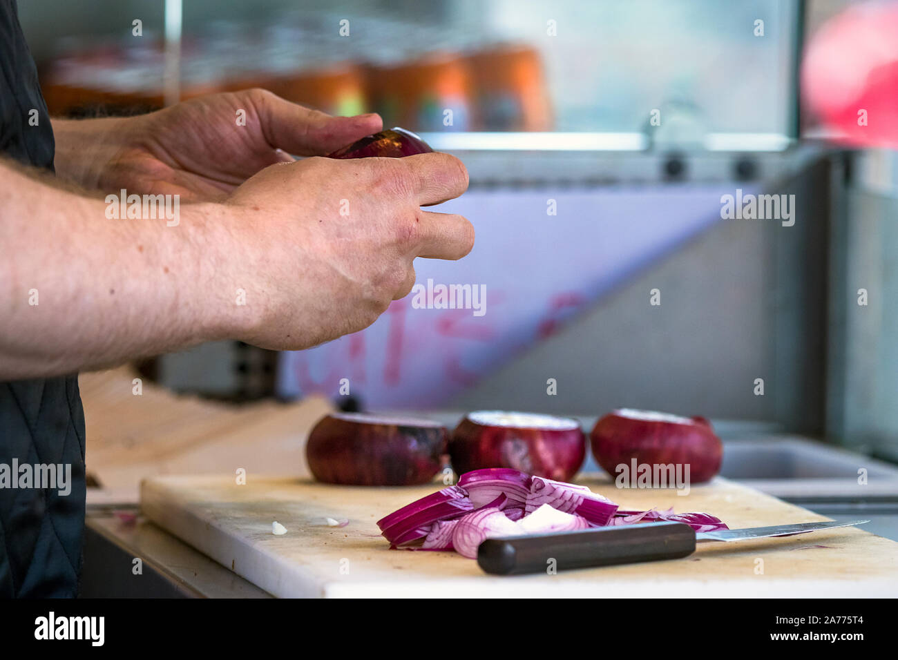 Man peeling onion hi-res stock photography and images - Alamy