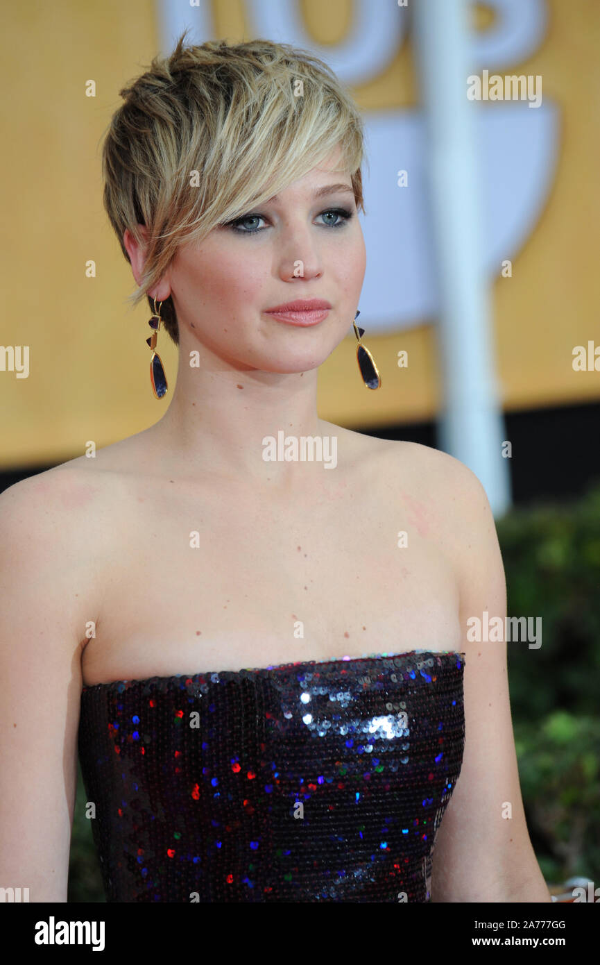 Bare Shoulders Short Hair Metallic Dress Sequins Stock Photos