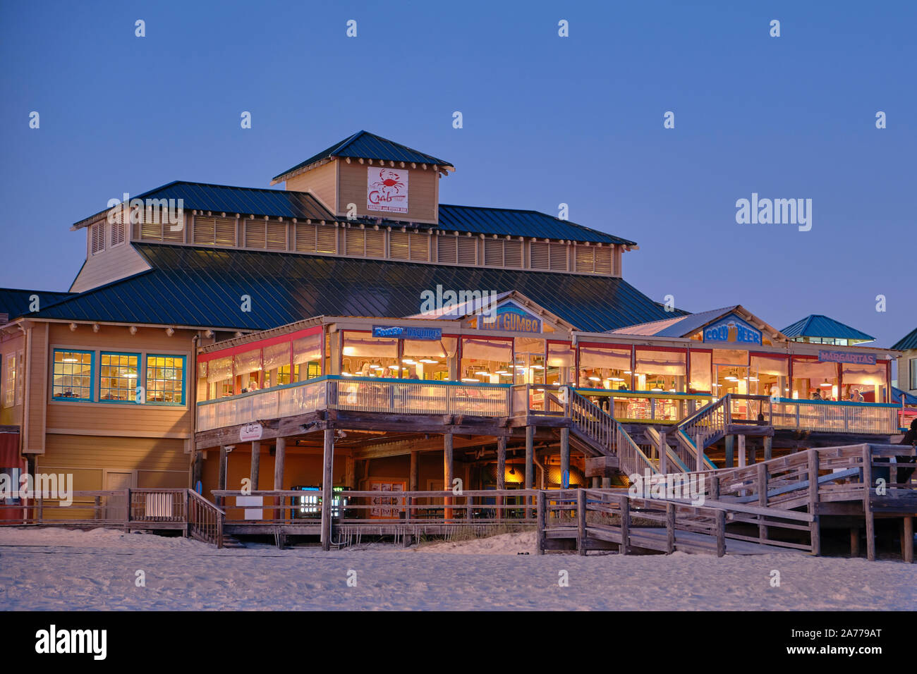 The Crab Trap beach bar and seafood restaurant on the beach at night on Okaloosa Island Florida, USA. Stock Photo