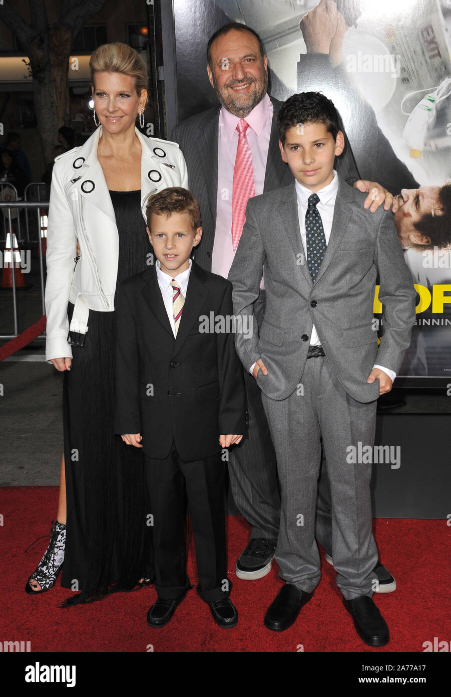 LOS ANGELES, CA - FEBRUARY 24, 2014: Producer Joel Silver & family at