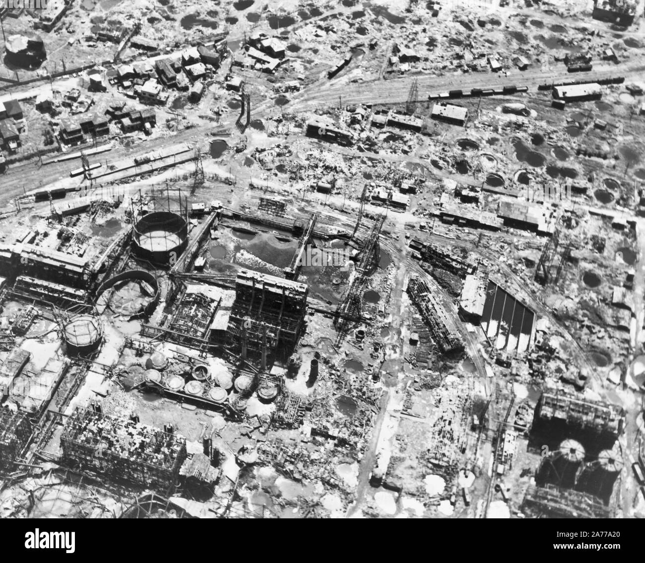 Low-level aerial view of destruction of a refinery in the Tokyo area, as the result of B-29 raids, during the five months of concentrated attacks on Japan, during the second world war, 1945 Stock Photo