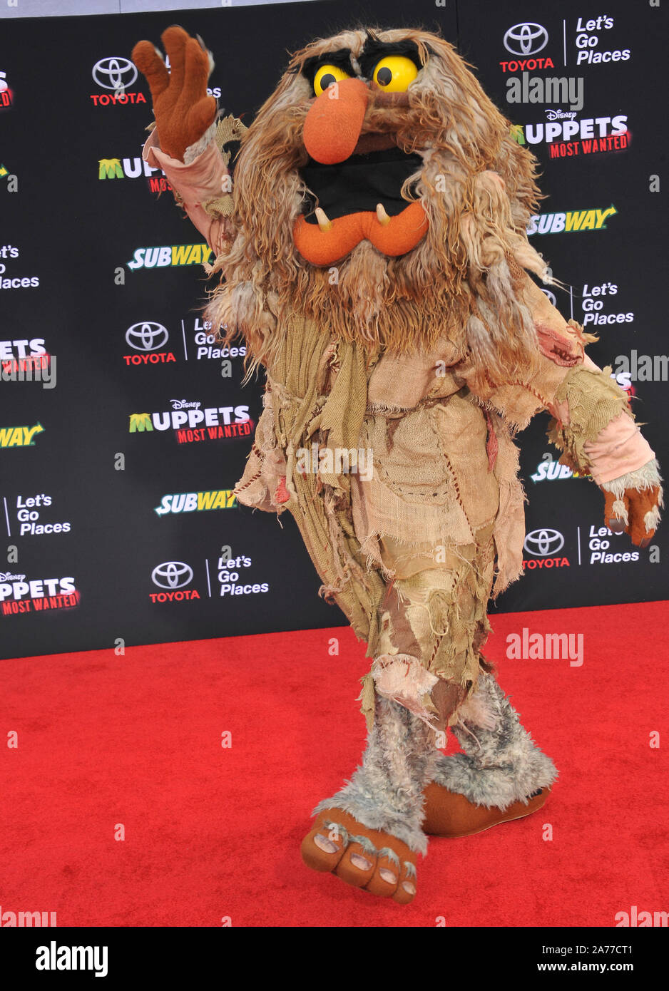 LOS ANGELES, CA - MARCH 11, 2014: Muppets' character Sweetums at the world premiere of her movie Disney's 'Muppets Most Wanted' at the El Capitan Theatre, Hollywood. © 2014 Paul Smith / Featureflash Stock Photo