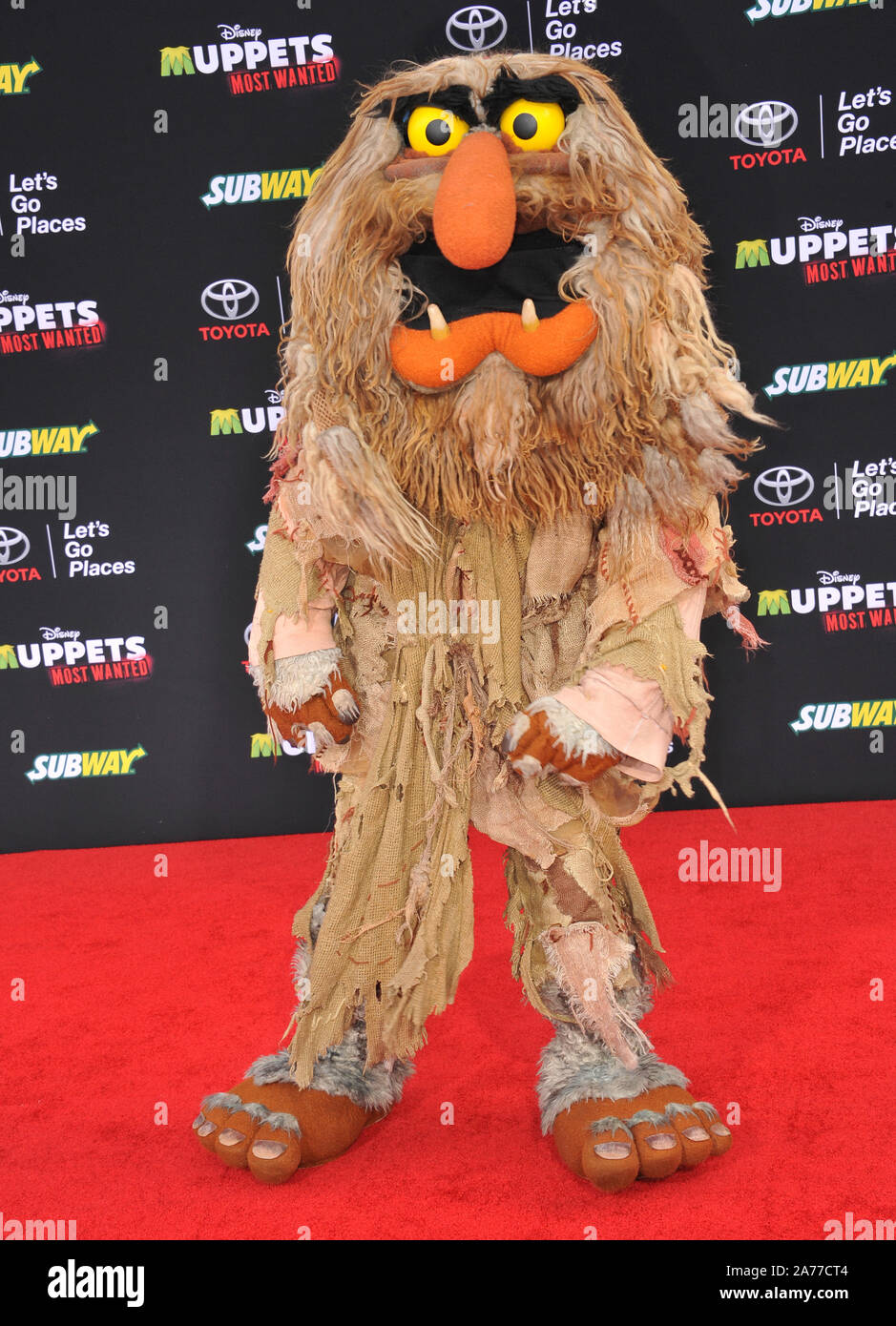 LOS ANGELES, CA - MARCH 11, 2014: Muppets' character Sweetums at the world premiere of her movie Disney's 'Muppets Most Wanted' at the El Capitan Theatre, Hollywood. © 2014 Paul Smith / Featureflash Stock Photo