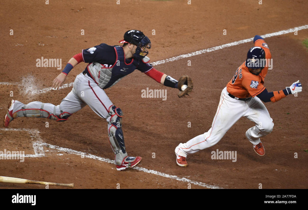 Houston, United States. 30th Oct, 2019. Washington Nationals catcher Yan Gomes tags out Houston Astros Robinson Chirinos in the fifth inning in Game 7 of the 2019 World Series at Minute Maid Park in Houston, Texas on Wednesday, October 30, 2019. The best-of-seven series is tied 3-3. Photo by Kevin Dietsch/UPI Credit: UPI/Alamy Live News Stock Photo