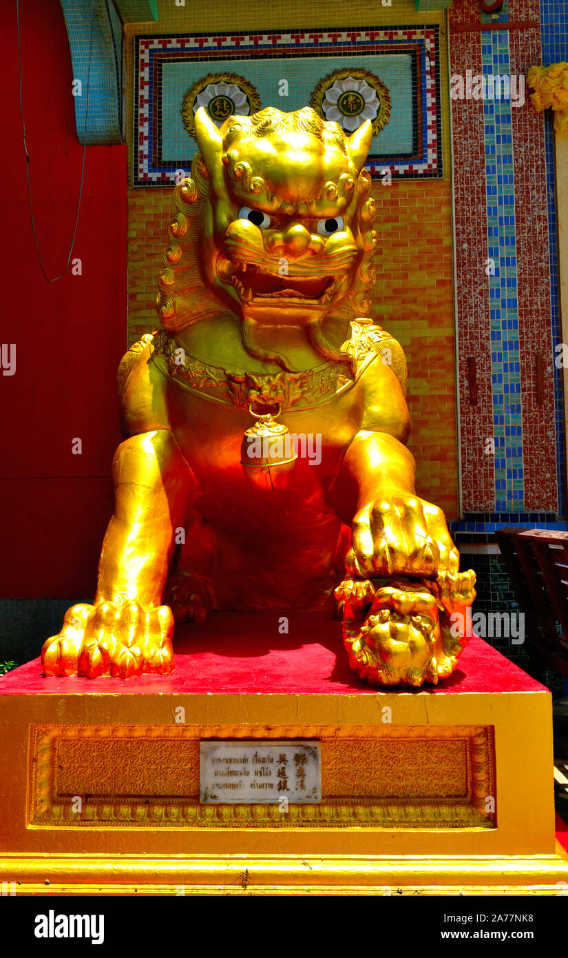 A Chinese Lion statue at Wat Tham Sua  Kanchanaburi Thailand Stock Photo