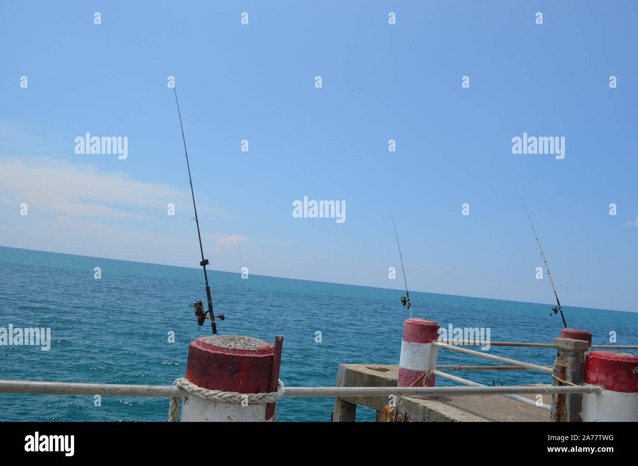 Three fishing rods hi-res stock photography and images - Alamy