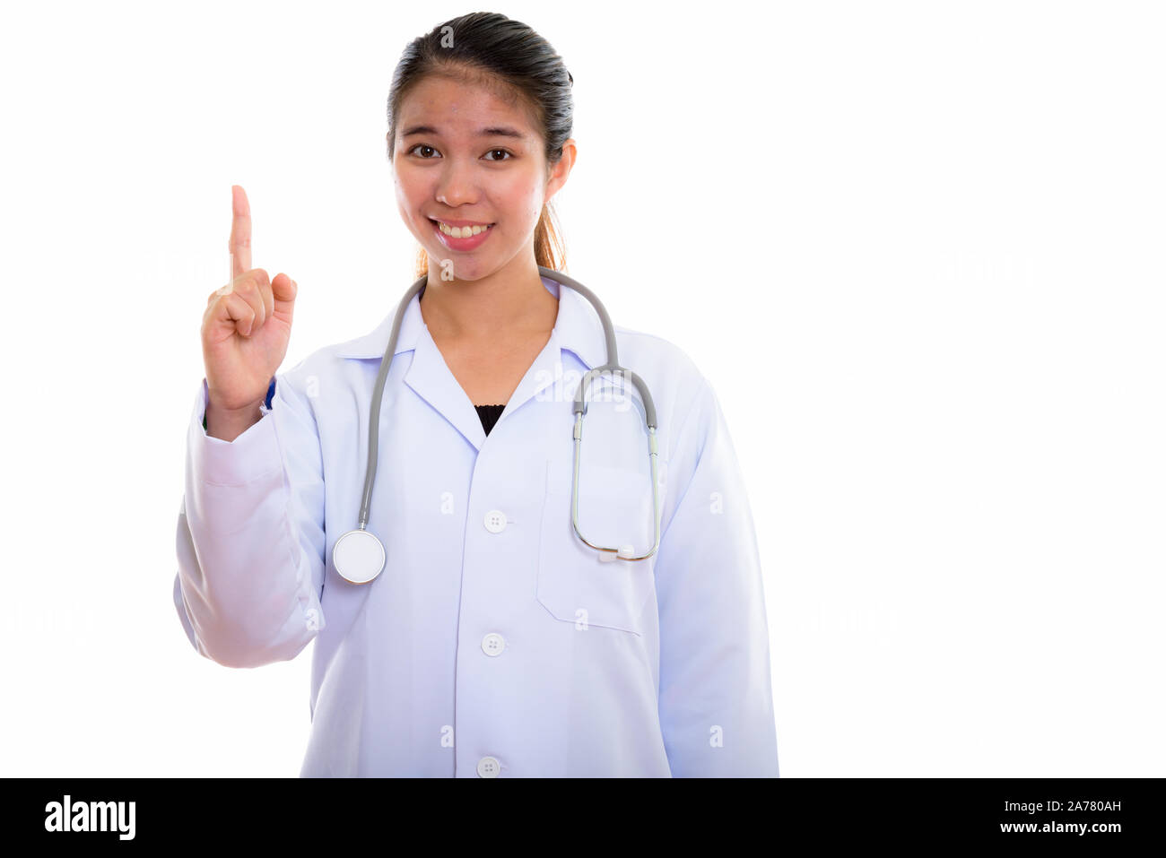 Portrait of young Asian woman doctor against white background Stock ...