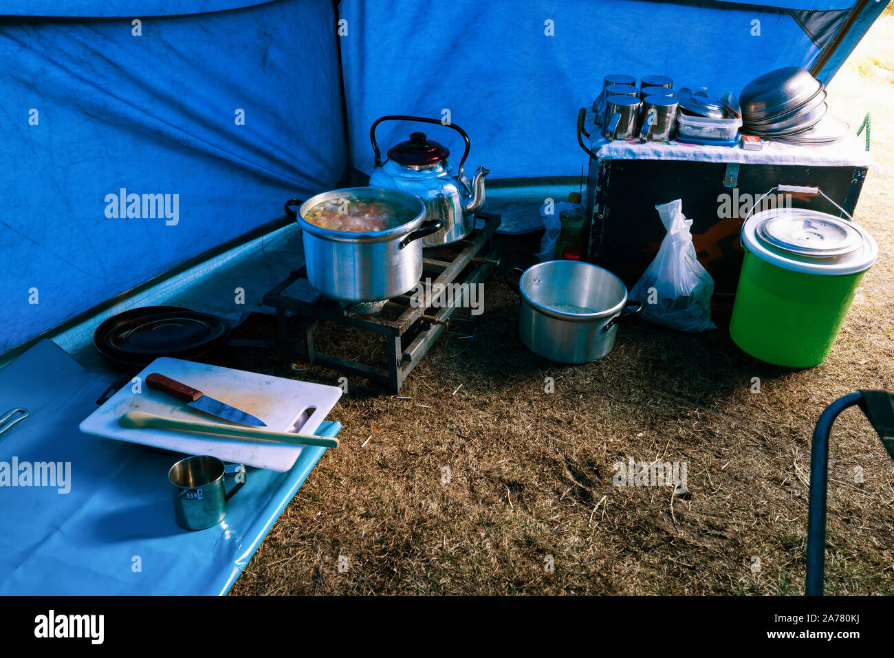 Inside cook's tent in Cordillera Blanca mountains, Peru Stock Photo