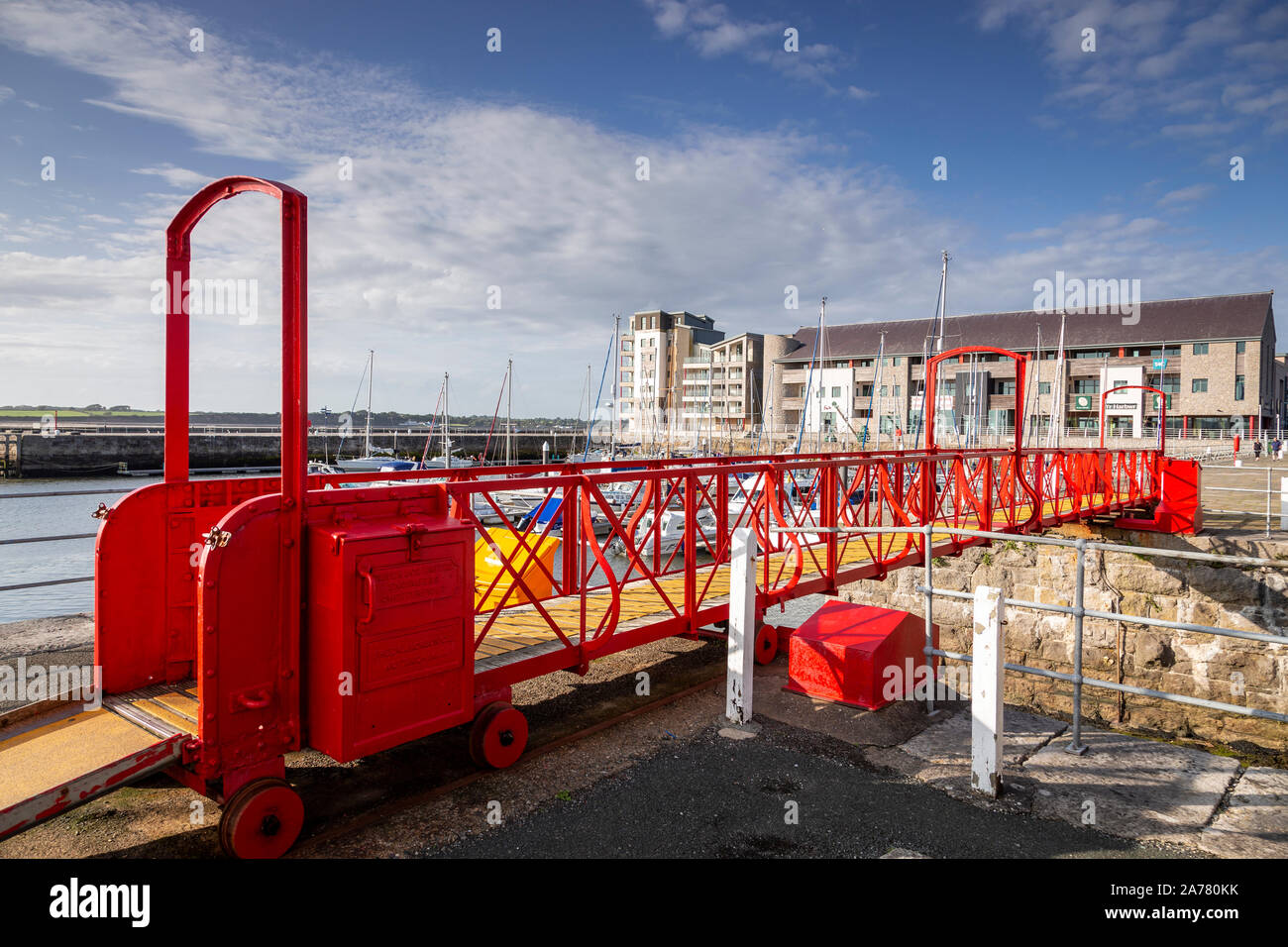 Red footbridge at Victoria Dock, Caernarfon, North Wales Stock Photo