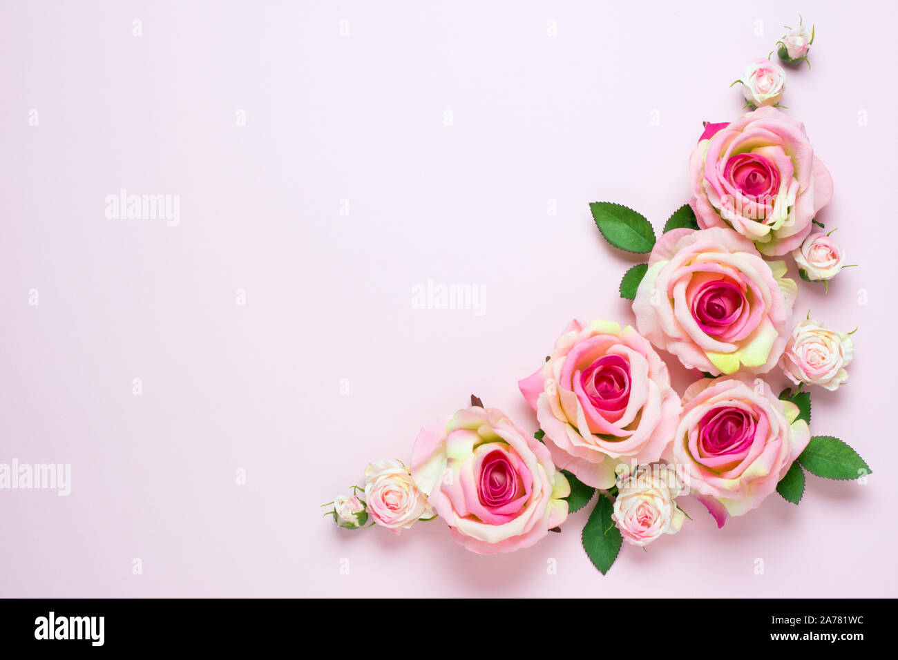 Beautiful Wedding Background With Pink Rose Flowers On Light Pink Background Stock Photo Alamy