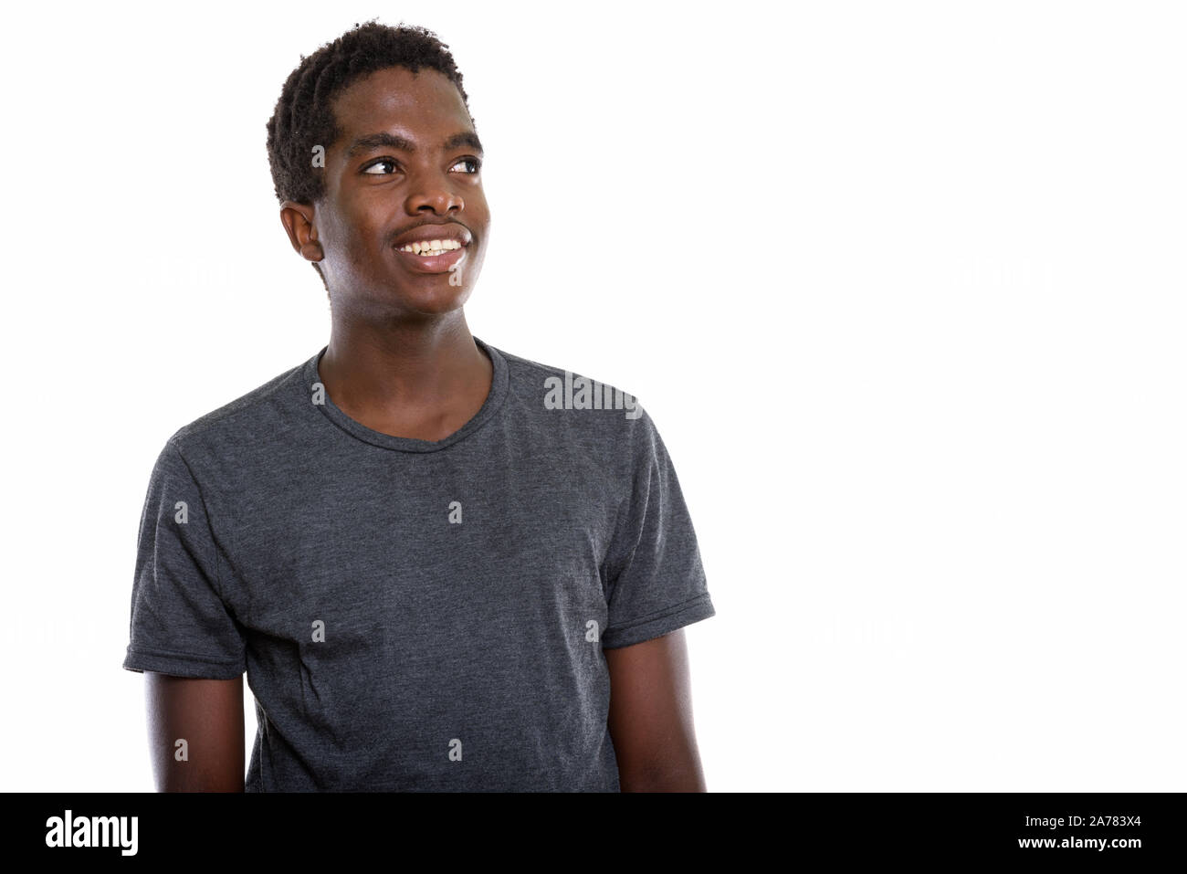 Studio shot of young African teenage boy with Afro hair Stock Photo - Alamy