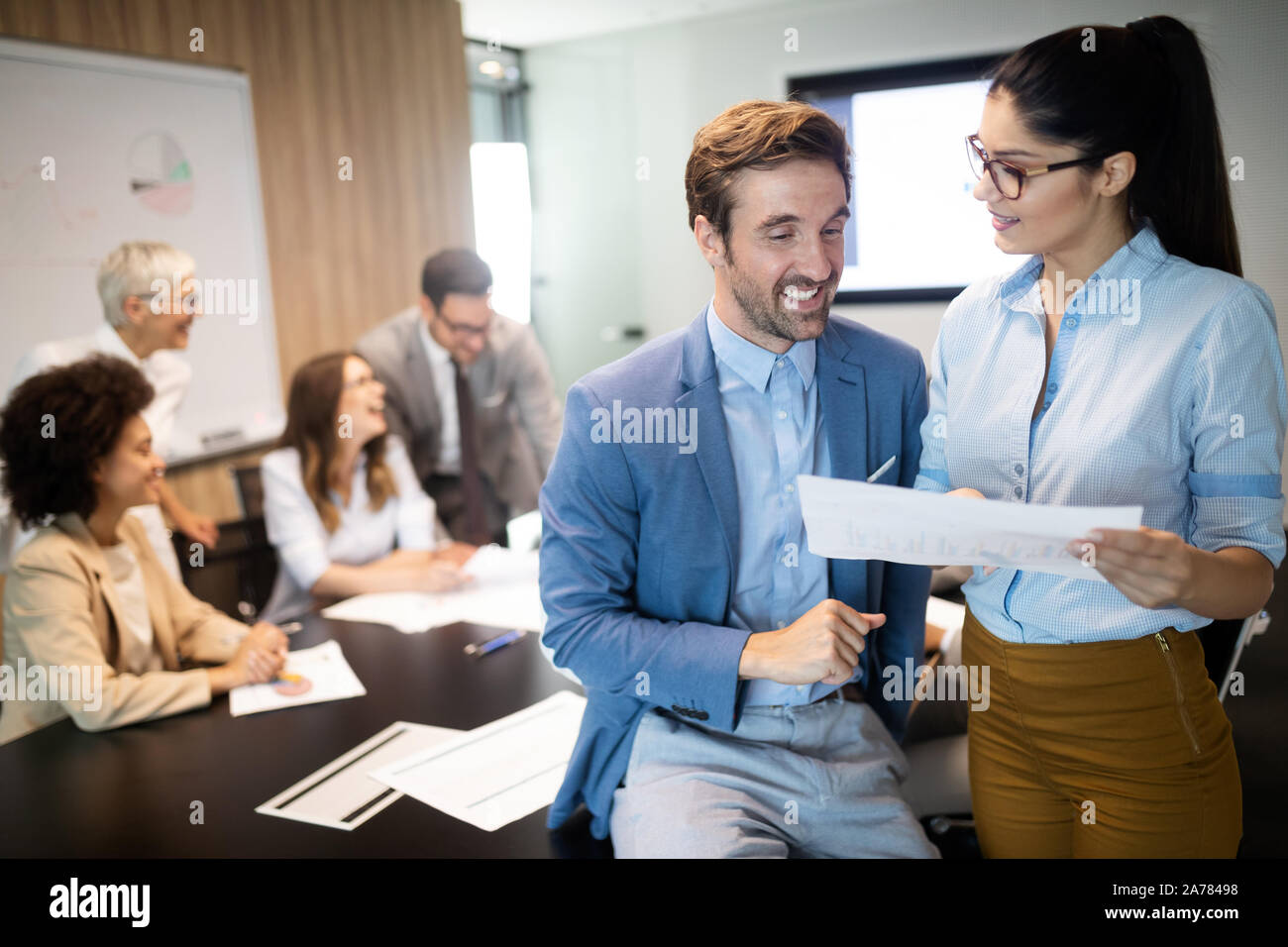 Group of successful business people at work in office Stock Photo - Alamy