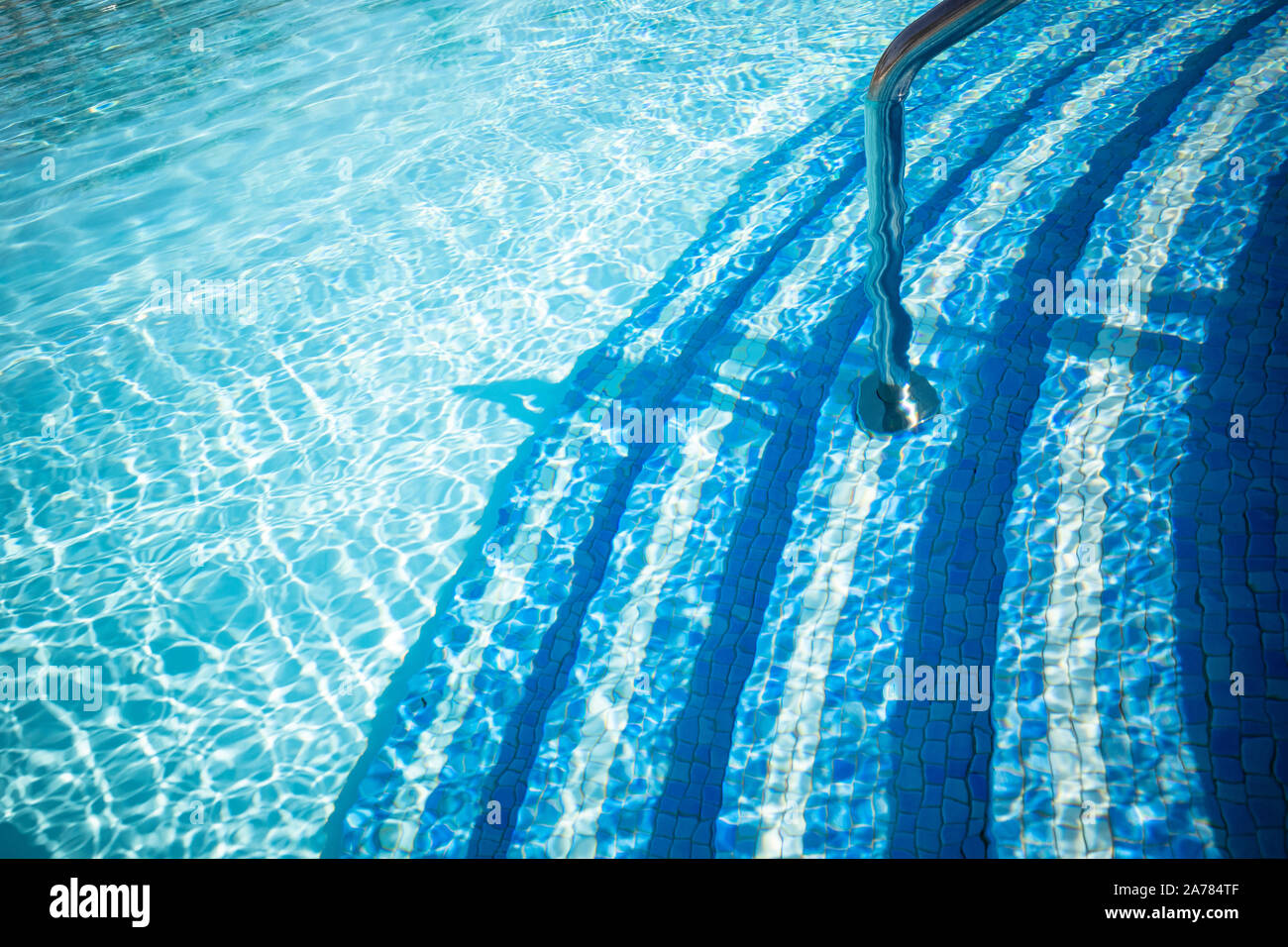 blue water in swimming pool Stock Photo