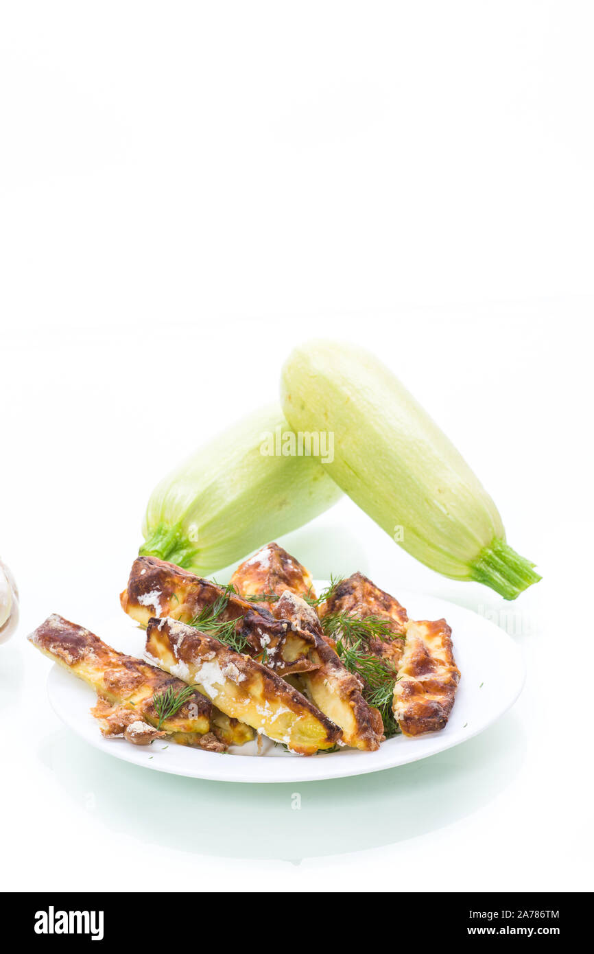 ovenbaked zucchini in batter with garlic and herbs Stock Photo Alamy