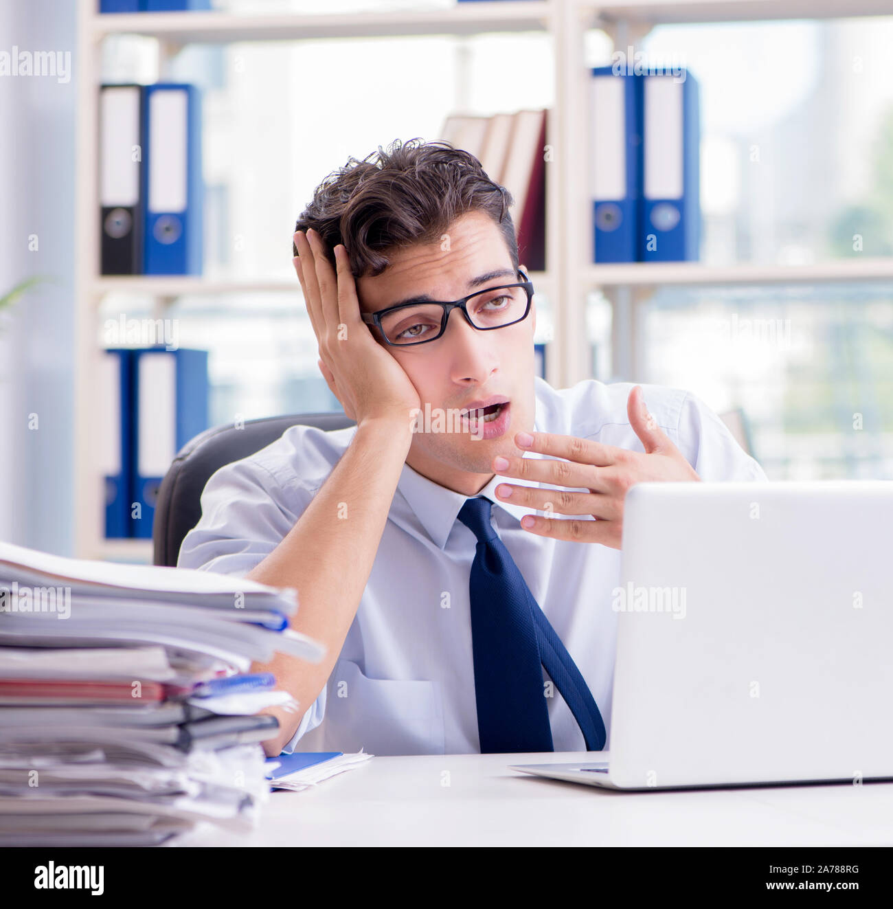 The tired exhausted businessman sitting in the office Stock Photo - Alamy