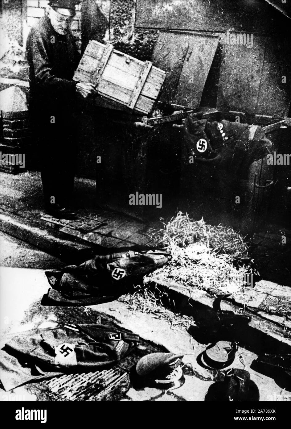 German uniforms abandoned after the defeat, World War II Stock Photo